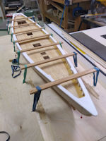 Bluenose in framing jig with main railing glued to the hull