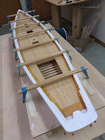 Bluenose in framing jig with main railing glued to the hull
