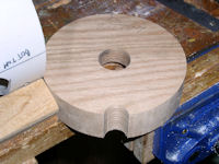 Groove in auger thrust bearing block