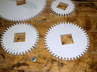 Gear-to-shaft connector holes cut