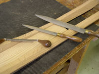 6" draw knife, #11 grain cabinet rasp, #6 grain cabinet rasp